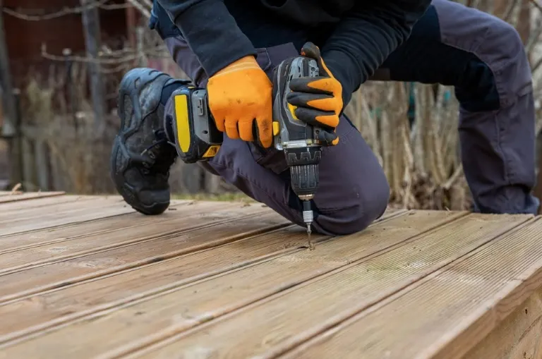 One Call Home Repair handyman completing a home repair in Everett
